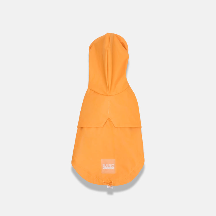 orange dog raincoat with added storm shield, available at Barc London