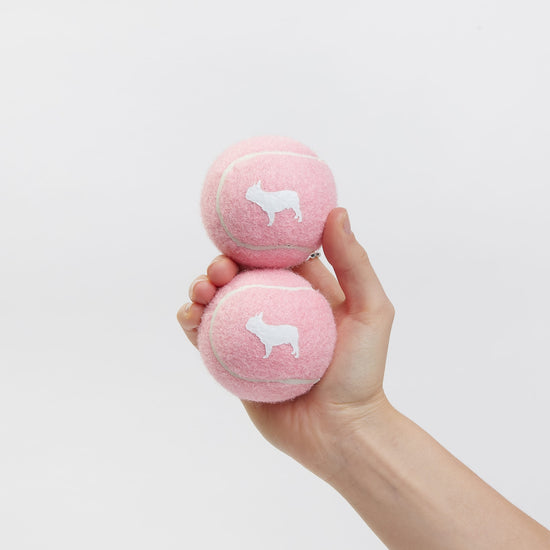 Your dogs favourite, a Barc London Tennis Ball in Pink.