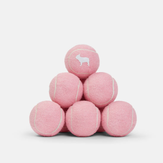 Stack of Pink Tennis Balls for Dogs