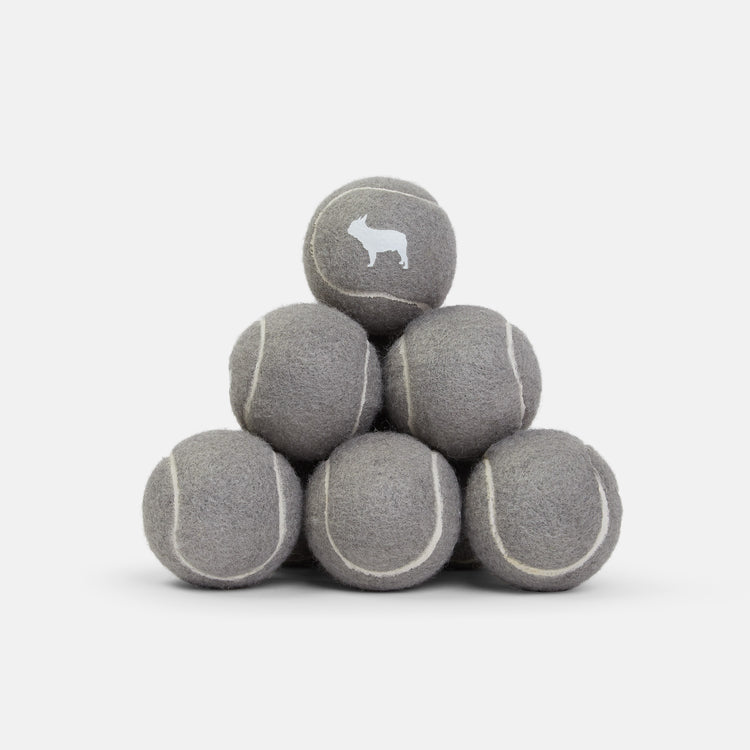 Stack of Barc London's Grey Tennis Balls