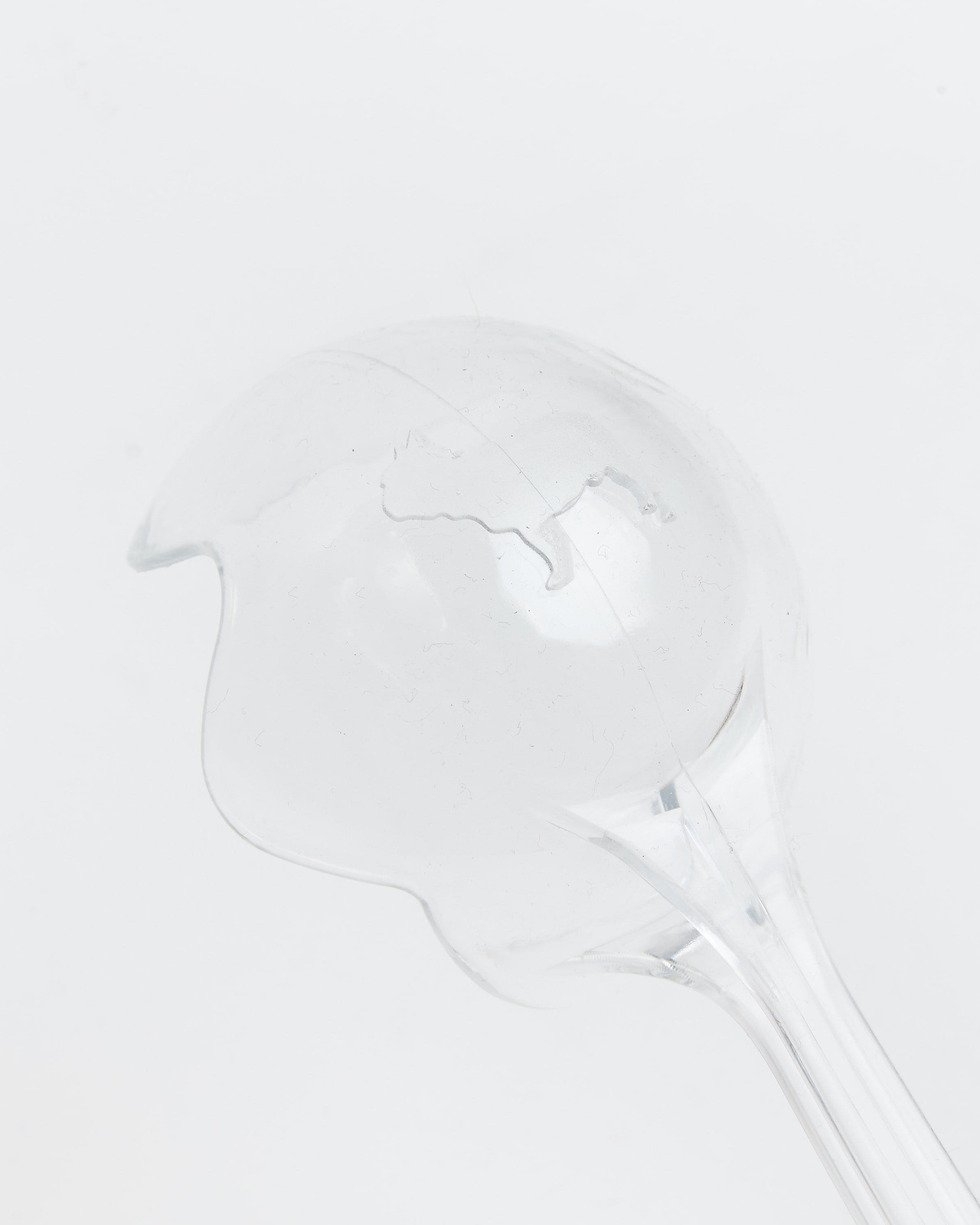 Close Up of Clear Dog Tennis Ball Thrower with Barc London Logo